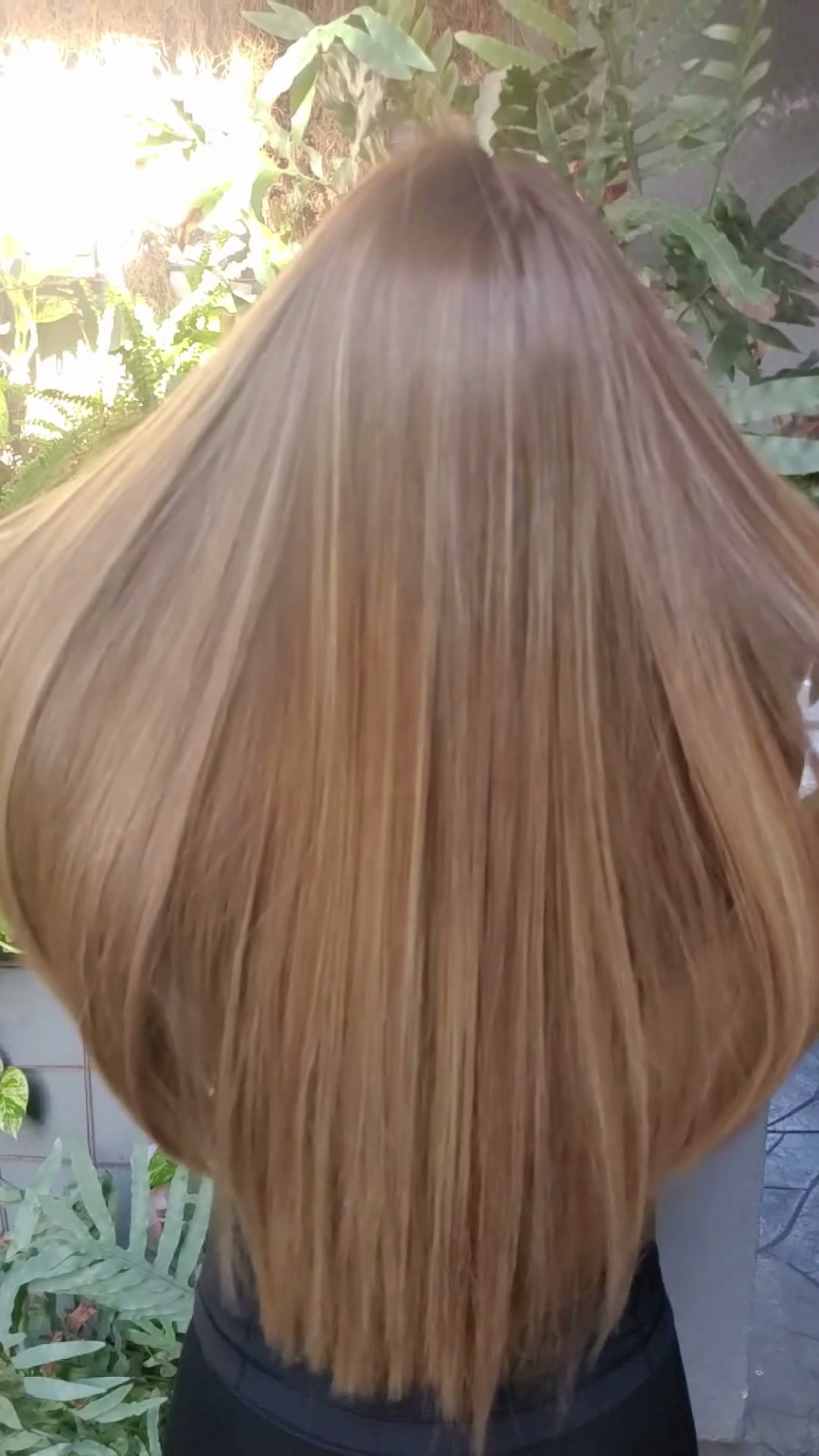 Smoothed brunette hair after treatment